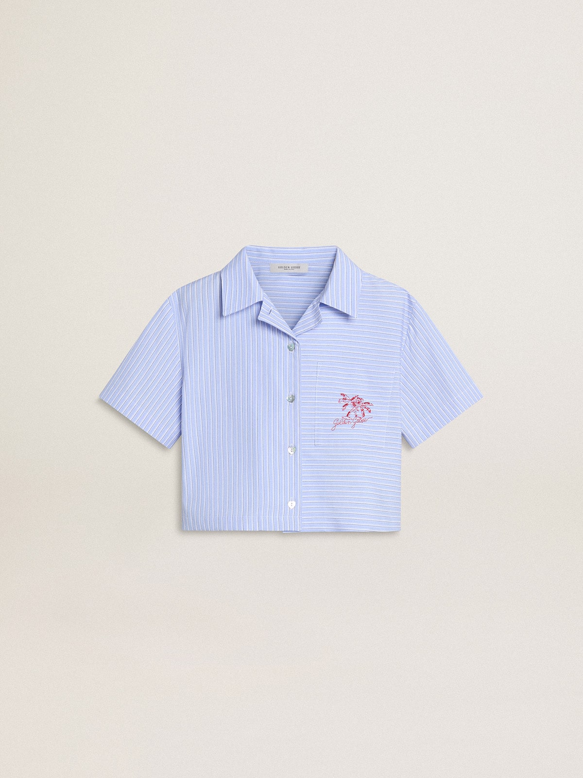 7110127bda808868fd913bb9dfba7b3f352038edc962e335a87d9cb64f6ca4e1 Girls' cropped shirt in striped light blue cotton - Image 1