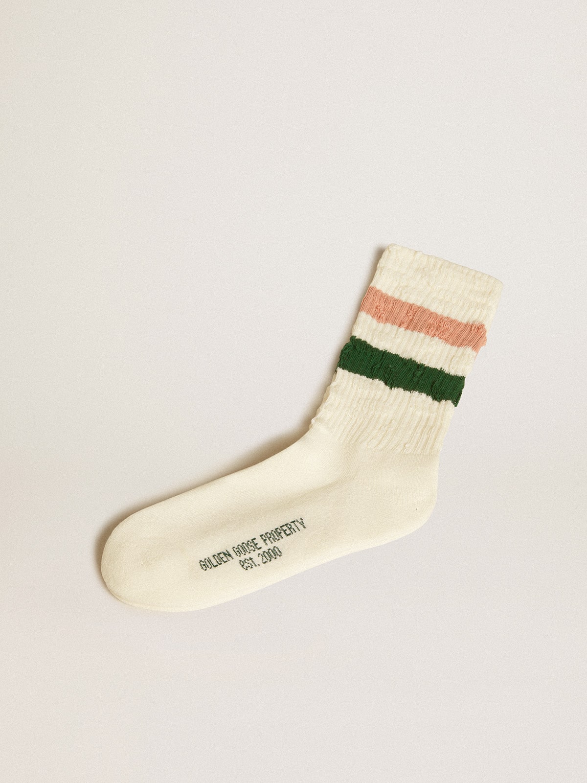 716e8532d1a3b7e66288f886ba01c23bd8f516d9359f898f4e0be373e30860cb Worn-white socks with distressed details and pink and green stripes - Image 1