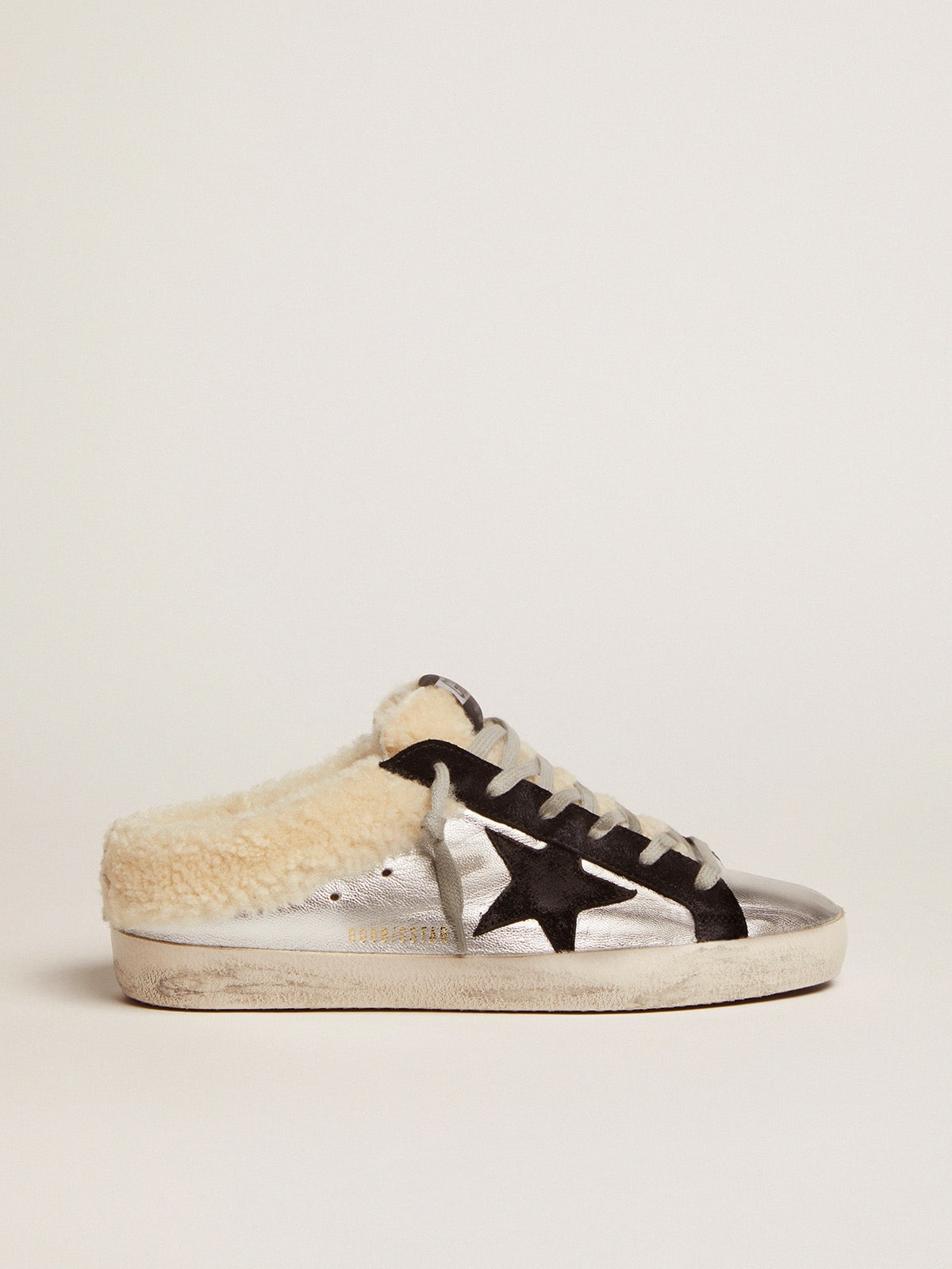 73c9ca272dccdbee355cf78cbc2e92e513d28dadcd951b1e650e7dd9047f272c Women's Super-Star Sabot in silver laminated leather with black star - Image 1