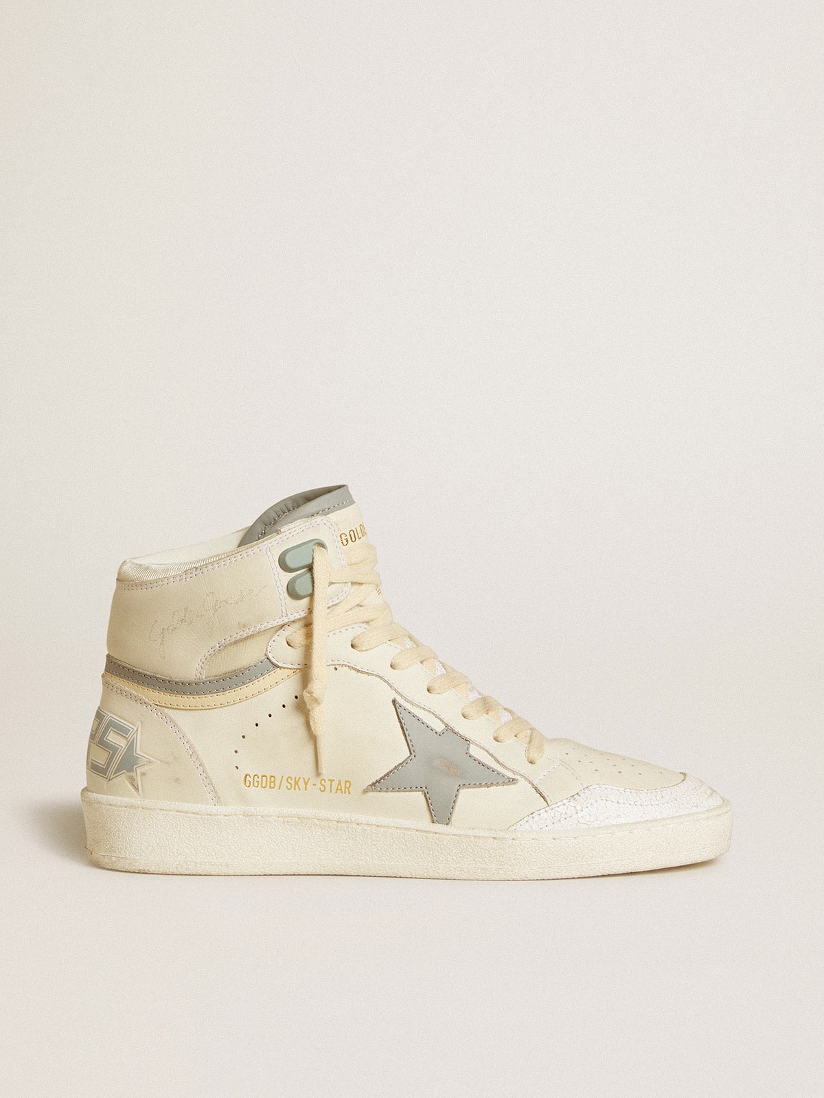 75a59fb6db7f84ab18071476d4a6c51bf6d11204f1d98405edcd256895202d3a Women's Sky-Star in leather with light blue leather star and white heel tab - Image 1