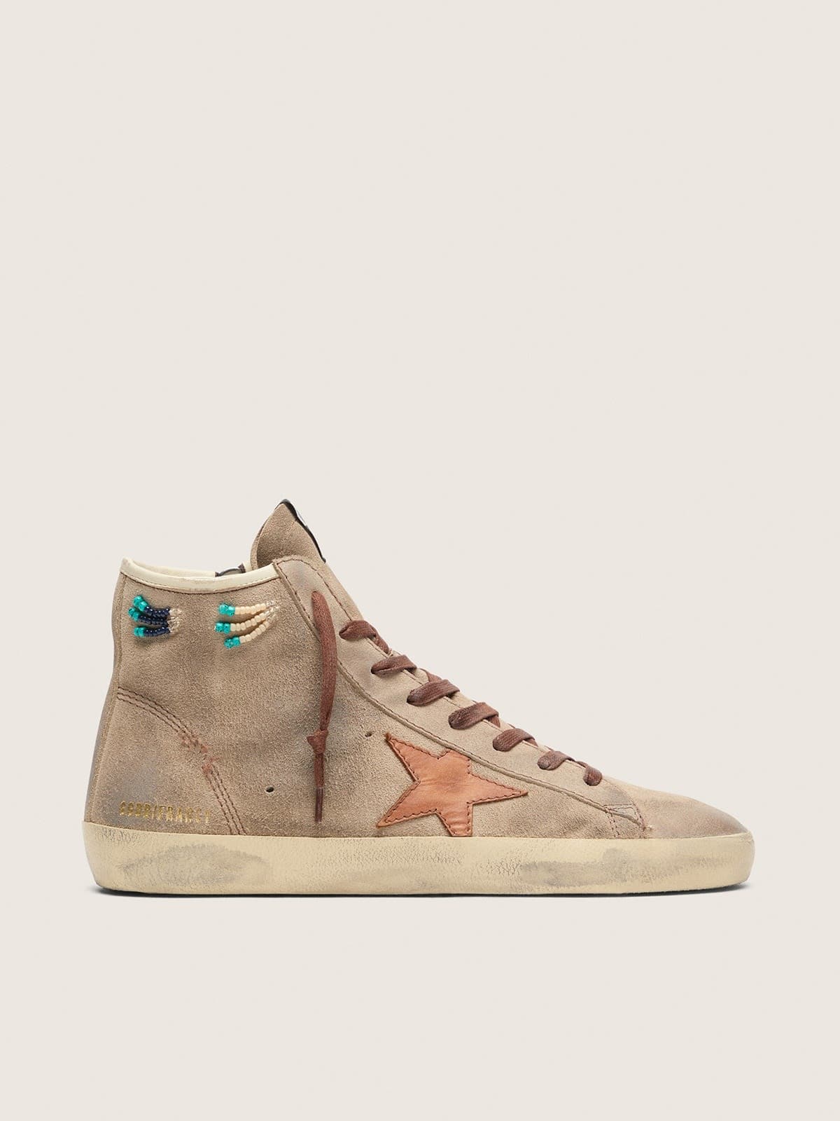 75e548a50761904966438c3b59e20f3847cba14711c8bf2f6009dd4da244215e Men's Francy in beige suede with brown leather star and colored beads - Image 1