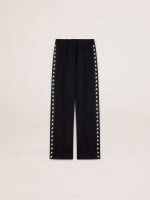 Women's black joggers with white stars on the sides