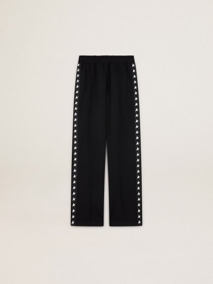 Women's black joggers with white stars on the sides