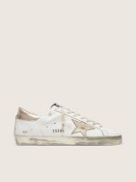 Women's Super-Star with gold sparkle foxing and metal stud lettering