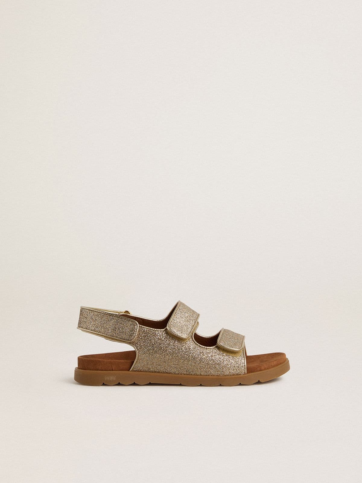 7a14f99498079799fa01fad3836b2e5f9447007a11b96fe2b81053cd28bfae60 Noa Junior sandals in micro-glitter and platinum leather - Image 1