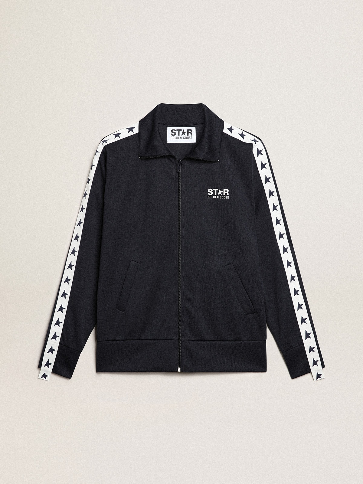 7a4d2dd87a4fbd3dfa54884467796ecc548b8eff863e2ea741de46215583be12 Dark blue sweatshirt with white strip and contrasting blue stars - Image 1