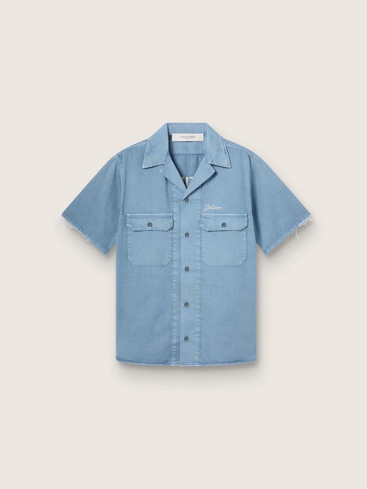 7c9e22e3be86982b2cef4c2bb54dfe8b3a35710eeb4b57216a189264c68c5c82 Unisex shirt in light blue denim with embroidery on the back - Image 1