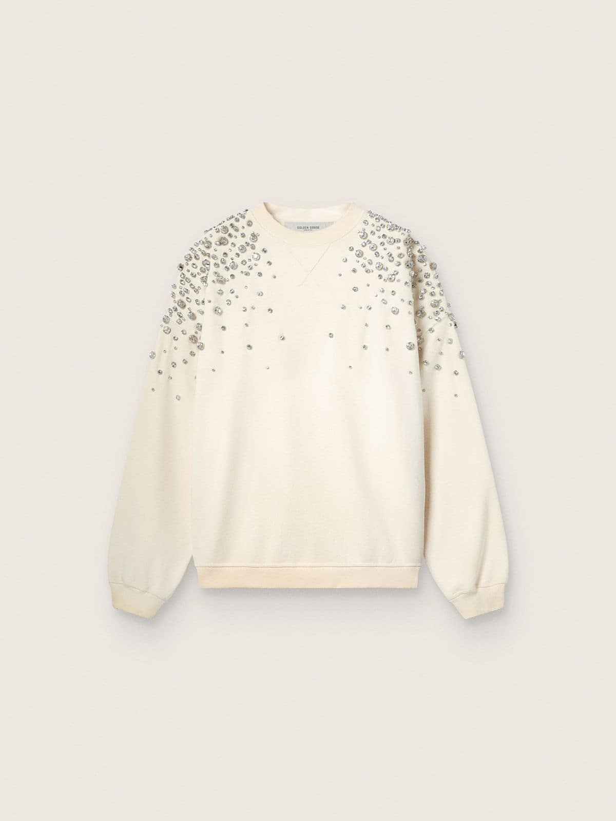 7cc8472c1854df1a757103ac075e22c96507cb251f51b57399a6c440fc86bce4 Unisex sweatshirt in white cotton with embroidered crystals - Image 1