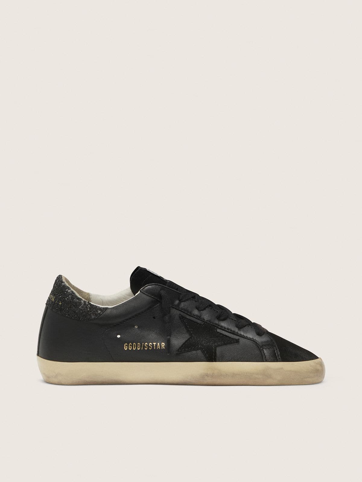 7e5380fa6f91ce8e383025d720c972fce898d935c0cdae1fa4d414866081db4d Women's Super-Star in black nappa with black star and glitter heel tab - Image 1