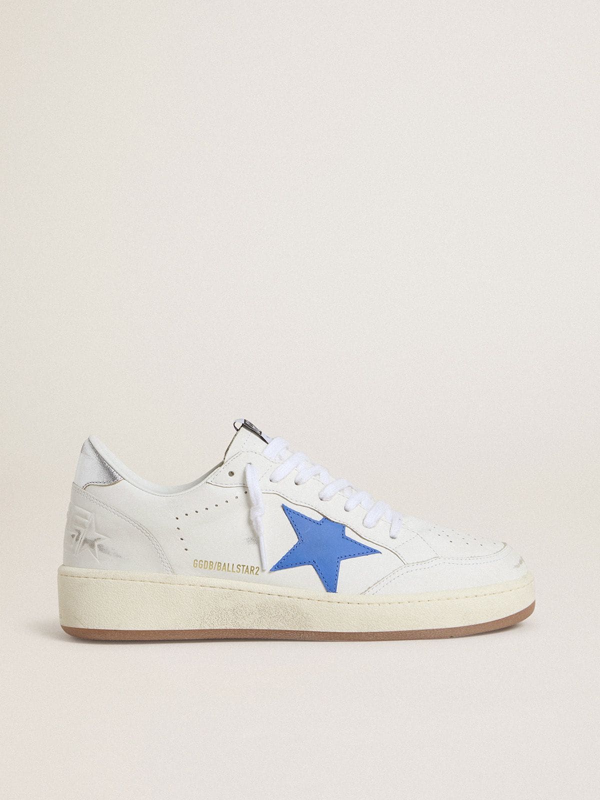 841fbf79ac06deeed3885cfdf0e32eb89f5a62e747cc6fca0cd9ce4fda2fa774 Ball Star with light blue leather star and silver foiled leather heel tab - Image 1