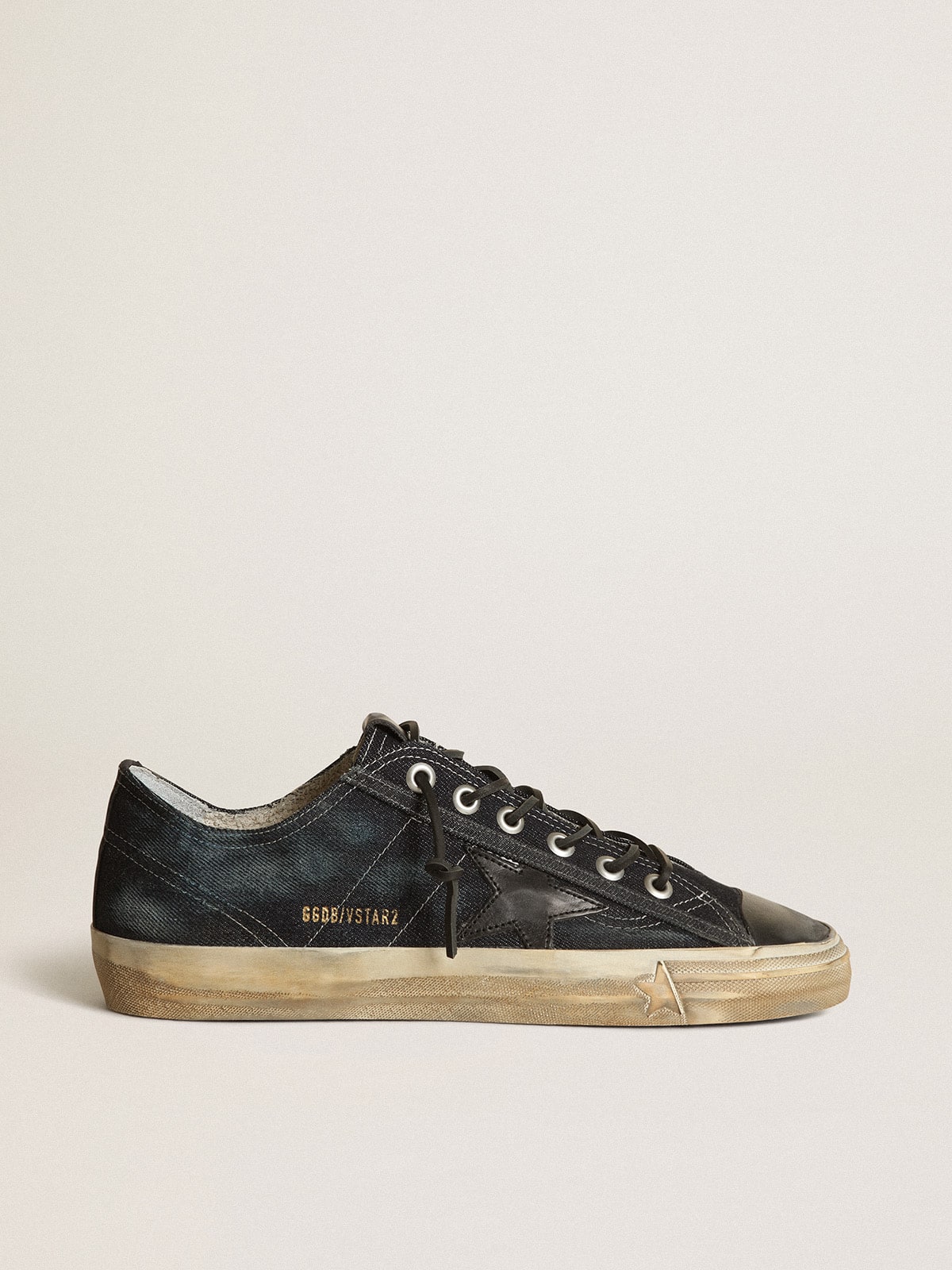 86d3831102af9523c499cf5757f7cbee3fd4b7c17607ae9ee0c9aa675b5626f1 V-Star sneakers in midnight-blue denim with black leather star and toe - Image 1