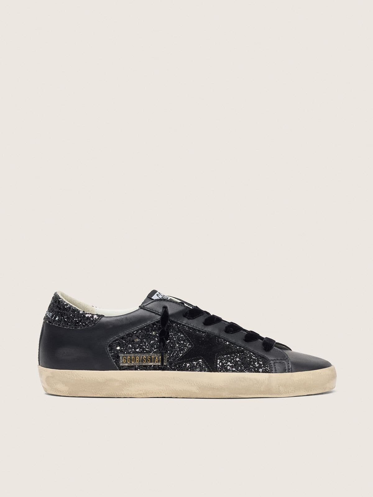 8f135b197e2950248269d7d7d917a7eed836ad7161ff09c6795374a11070a9d4 Women's Super-Star in black glitter with black suede star and leather inserts - Image 1