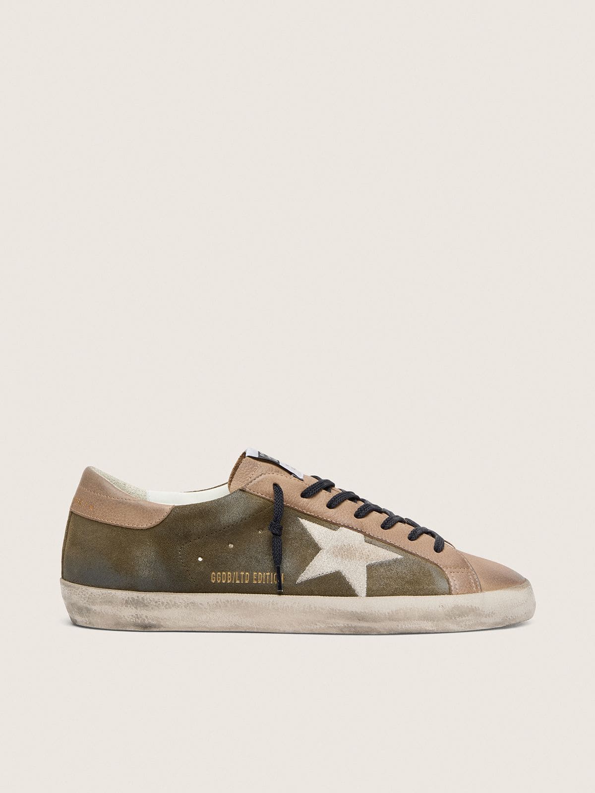 91f7a2ef7acdda480909cef5f625fc08d3e9210dfdcfa5856bd4198ff0a658c8 Men's Super-Star LTD in olive-green suede with cream embroidered star - Image 1
