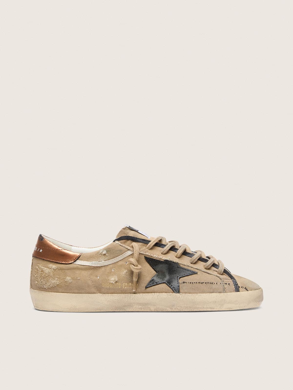 950427e99b017ed071847d3a88e09aa7388b22b64e9137e18ccd16e9b7c25cca Men's Super-Star LTD in beige canvas with black leather star - Image 1