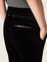 Women's slim-fit flared pants in black cotton velvet - Image 4