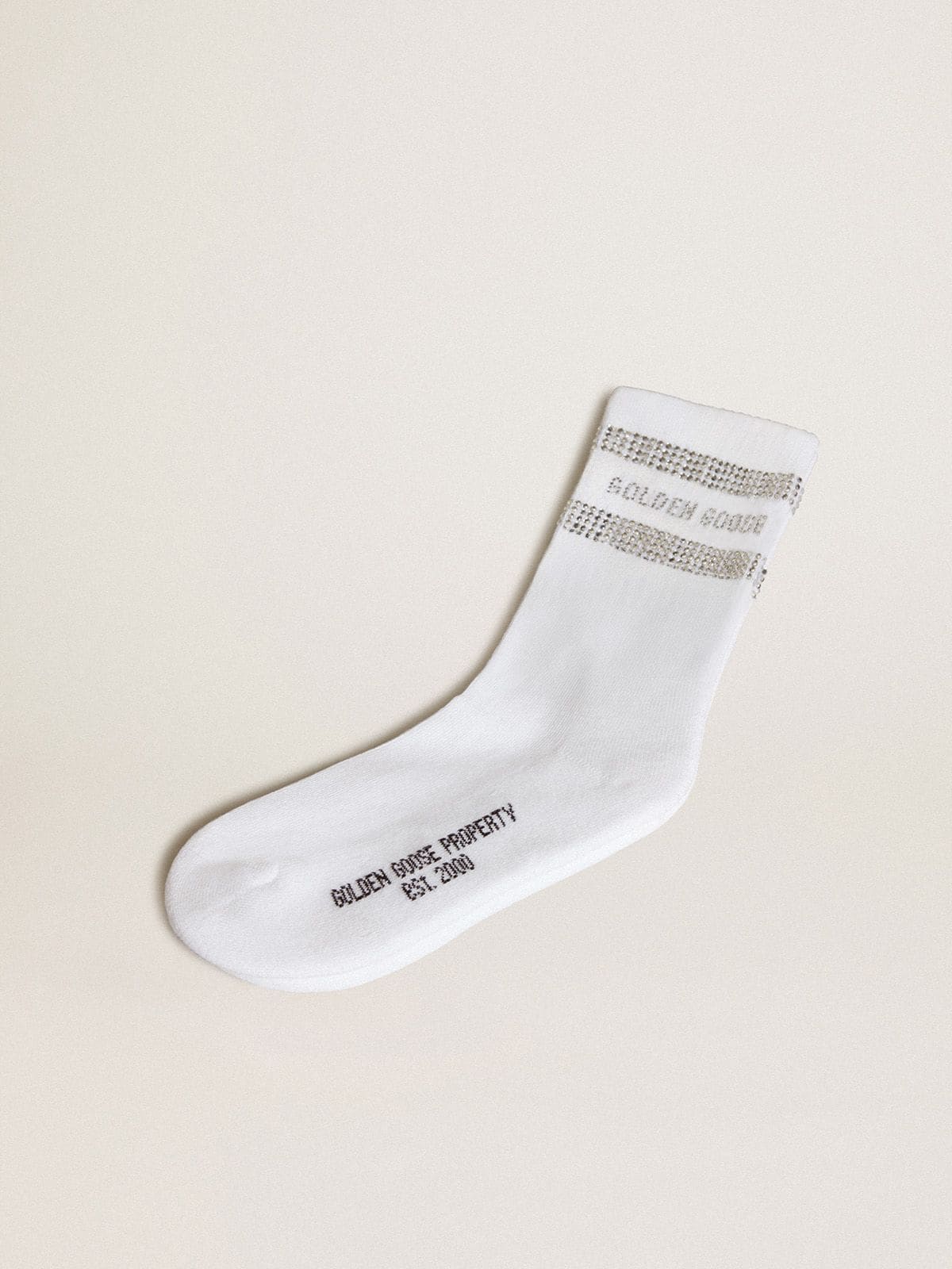 9682d223fc764fb34fea9a283d8def06b0c89899fd1727e832046962efc0dedb Unisex socks in white cotton with decorative crystals - Image 1