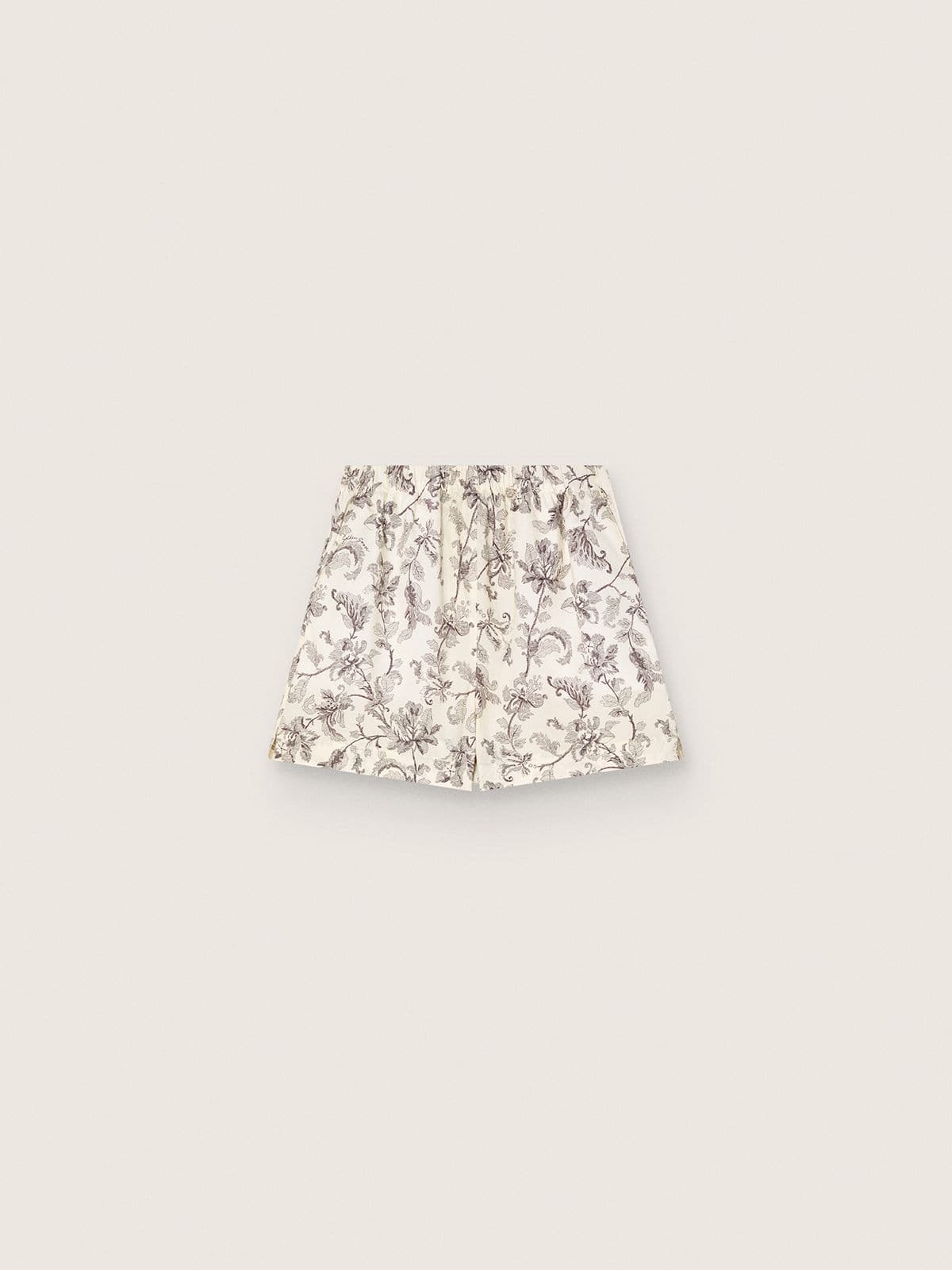 99288dab8bc0d7a32019dde8975f4e98ca2d7db693e6aa13ac91b99c75391462 Women's shorts in black and white cotton poplin with floral print - Image 1