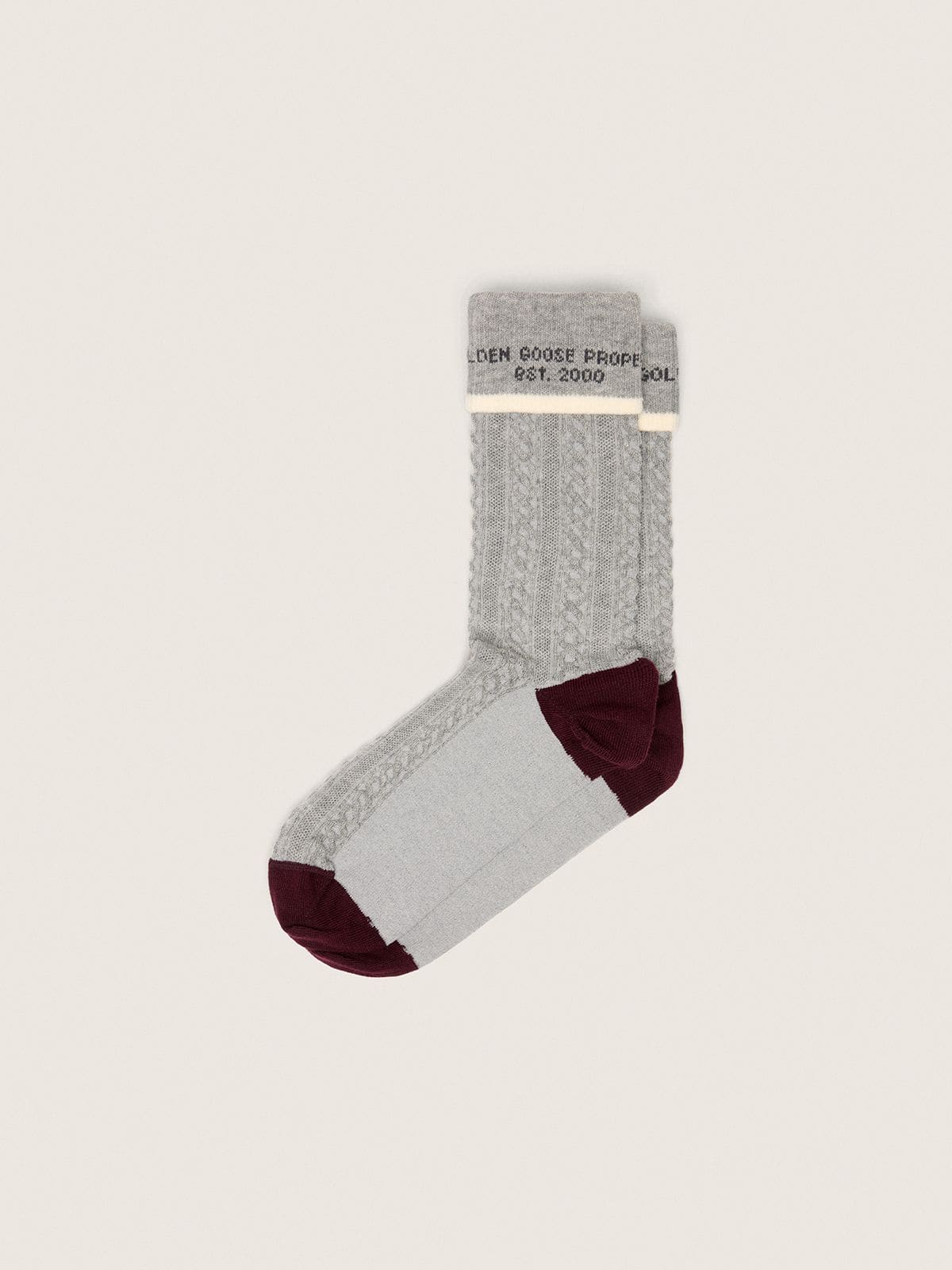 9b2629903693d261dcb40ba7a88394d9e9892edca9c218692be57536c7b2e1a0 Gray socks with turn-up and burgundy and cream details - Image 1