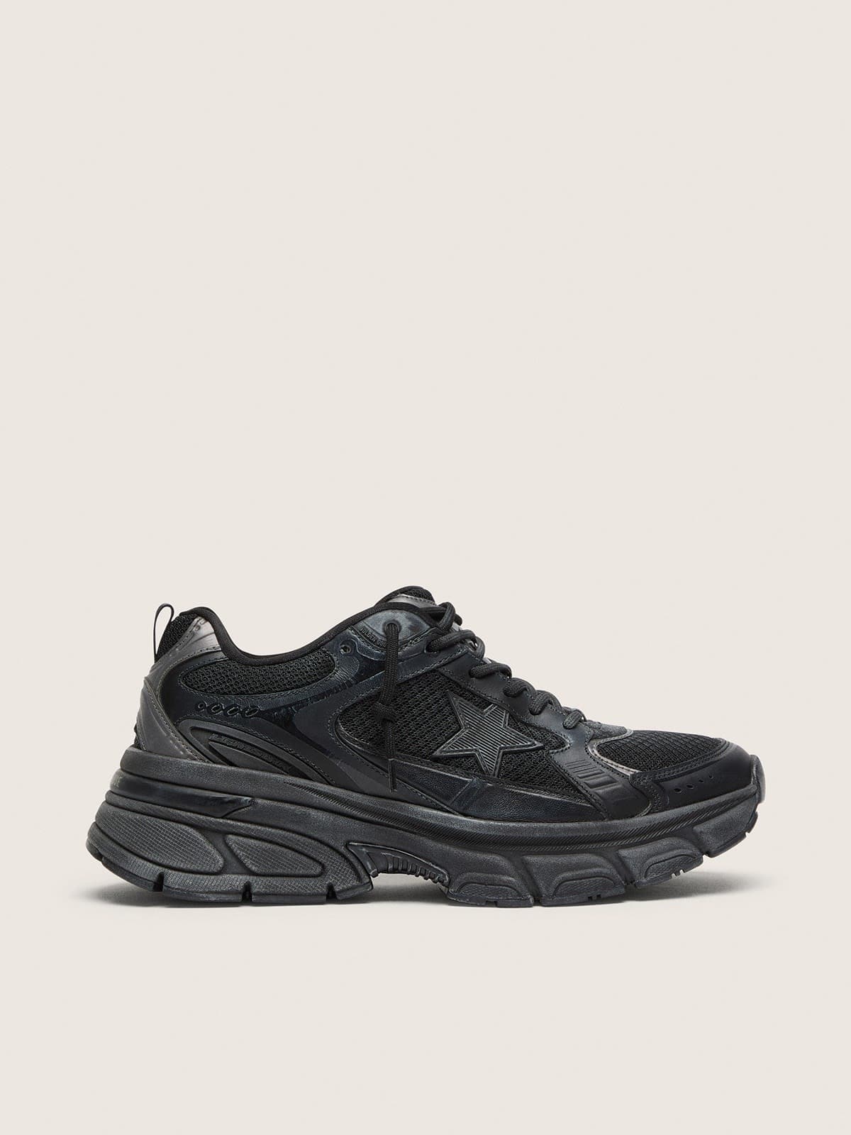 9d31bdb511efe1c34469550e75bbb5481fe568f2633a2e143093d55ea59471a3 Men's Lightstar with black leather and mesh upper and black star - Image 1
