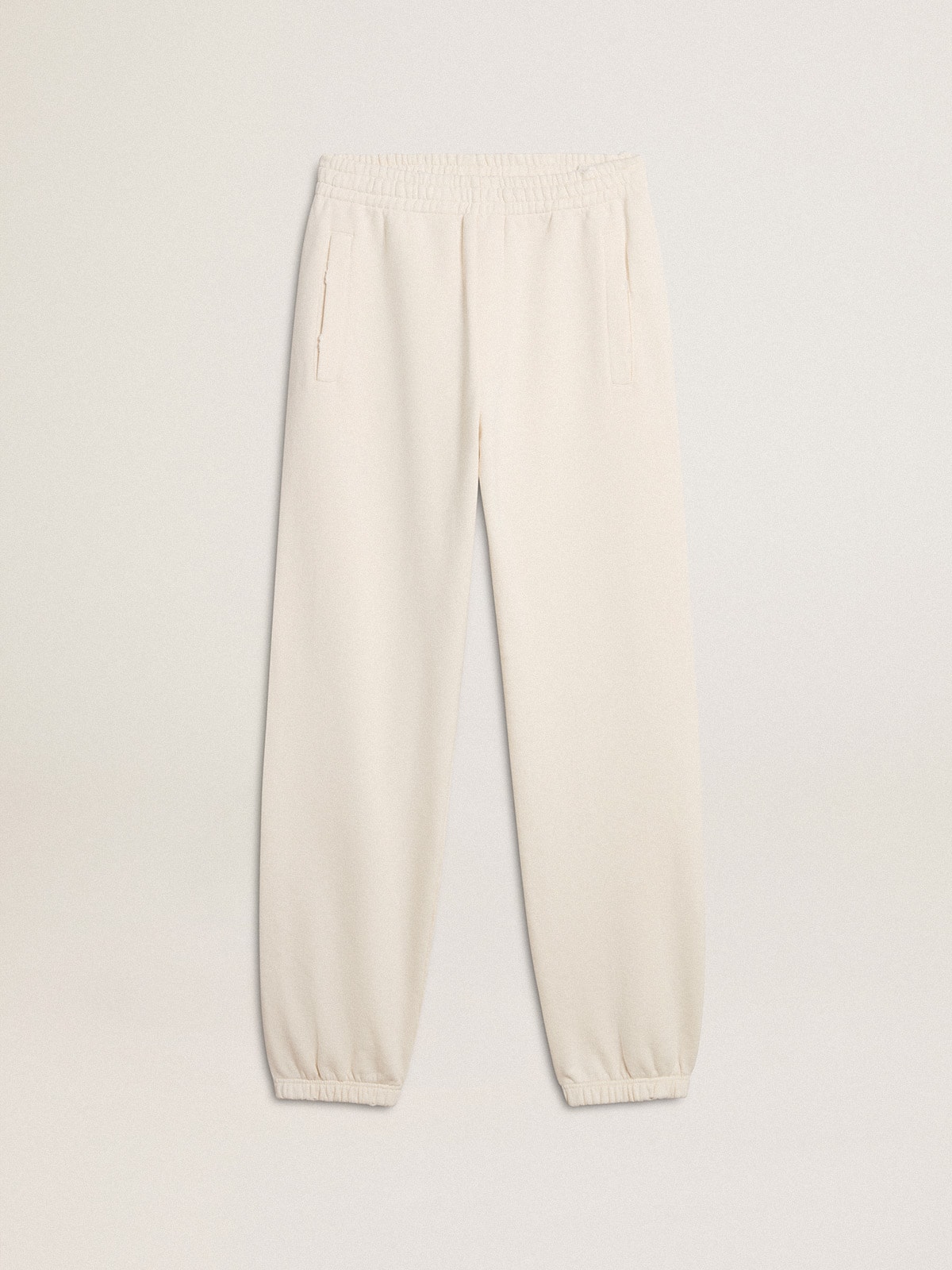 a11722adebb368177bc1352dd6b4d7ba8c6151288604edbe9252aeff3f2dd403 White joggers - Image 1