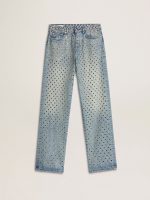 Women's washed jeans with all-over eyelets