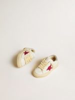 May Young with fuchsia glitter star and metallic leather heel tab - Image 2