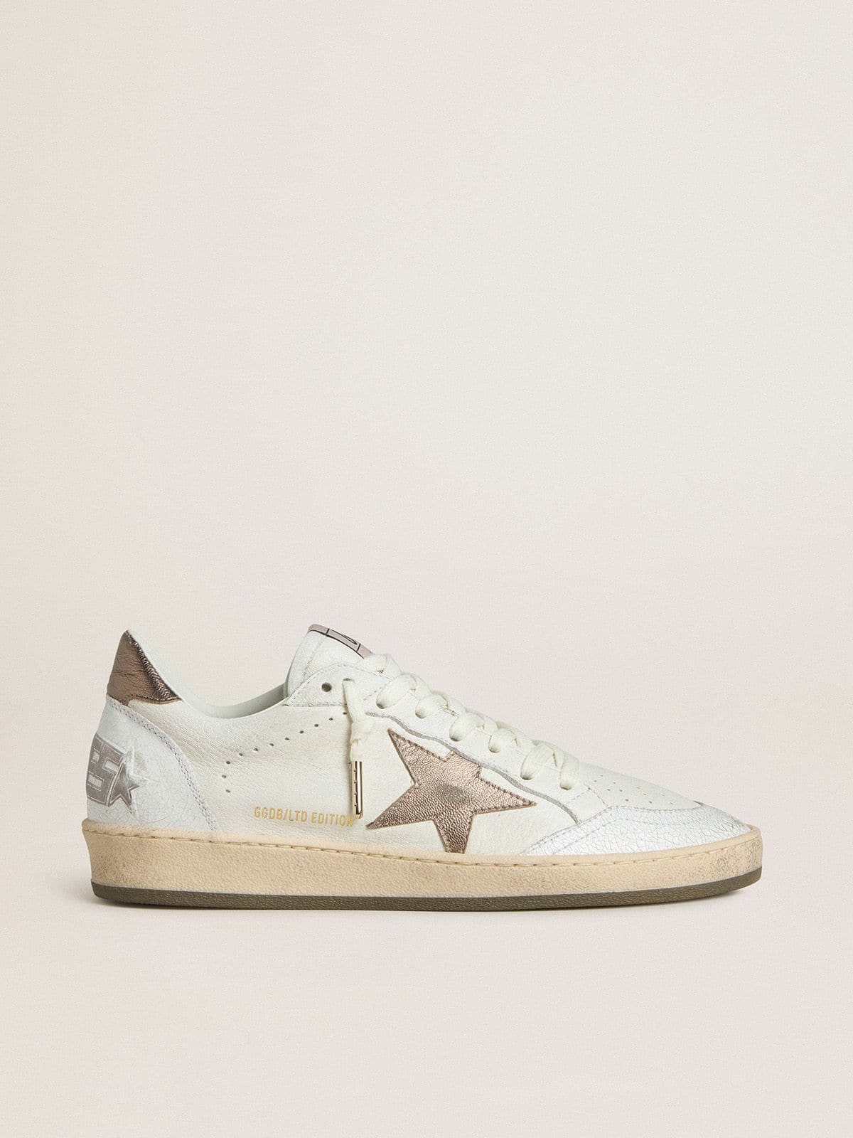 a4411a5874314f905540cbabe83acd2b48b256088710f4f345f301b32141e748 Women's Ball Star Wishes in white leather with metallic bronze leather star - Image 1