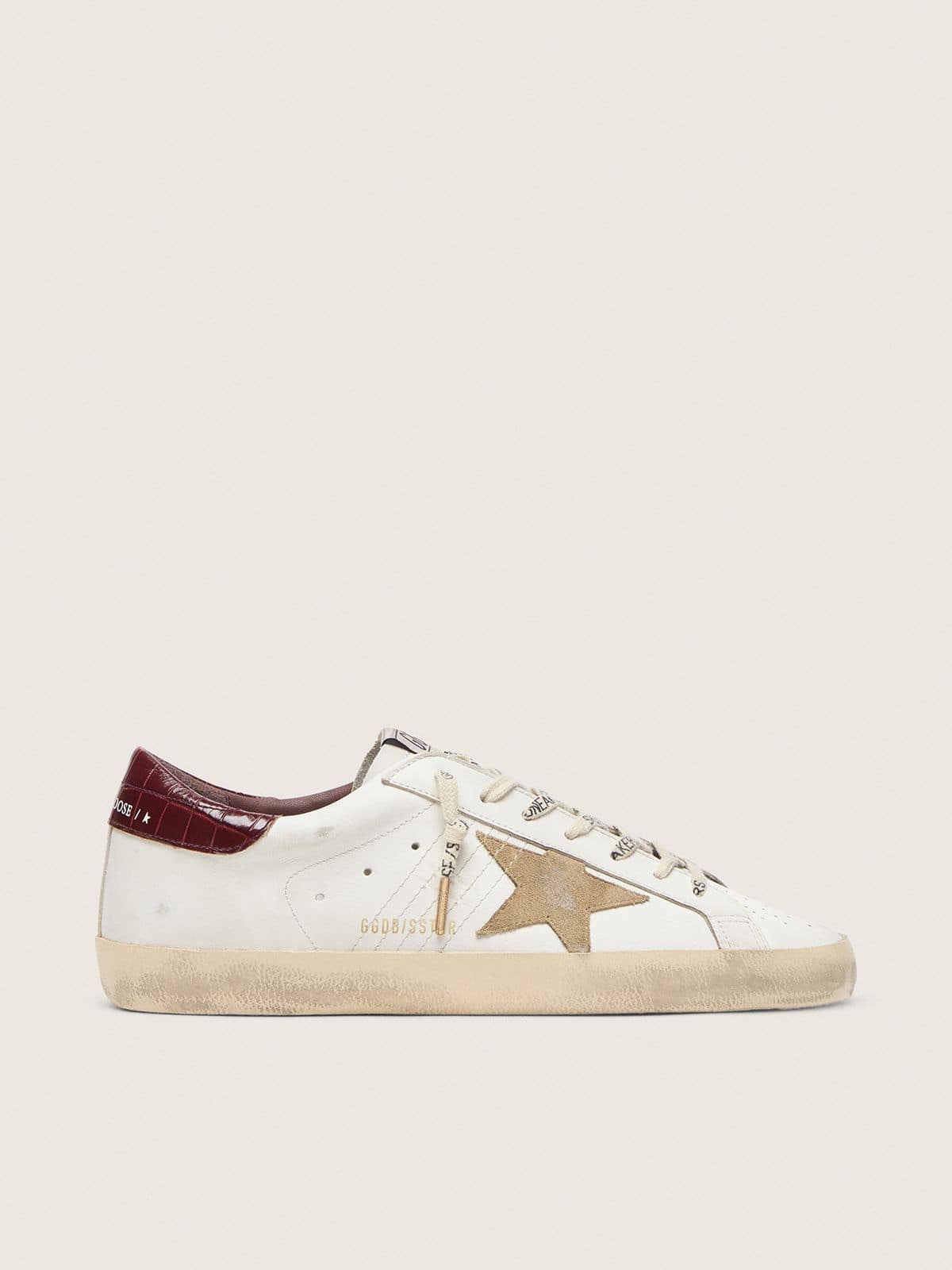 a7b13dfa1244ad9ca740415188fedfaf4b0da0ba74bc4ac6ac9fa491a634bc52 Men's Super-Star with sand suede star and red croc-print leather heel tab - Image 1