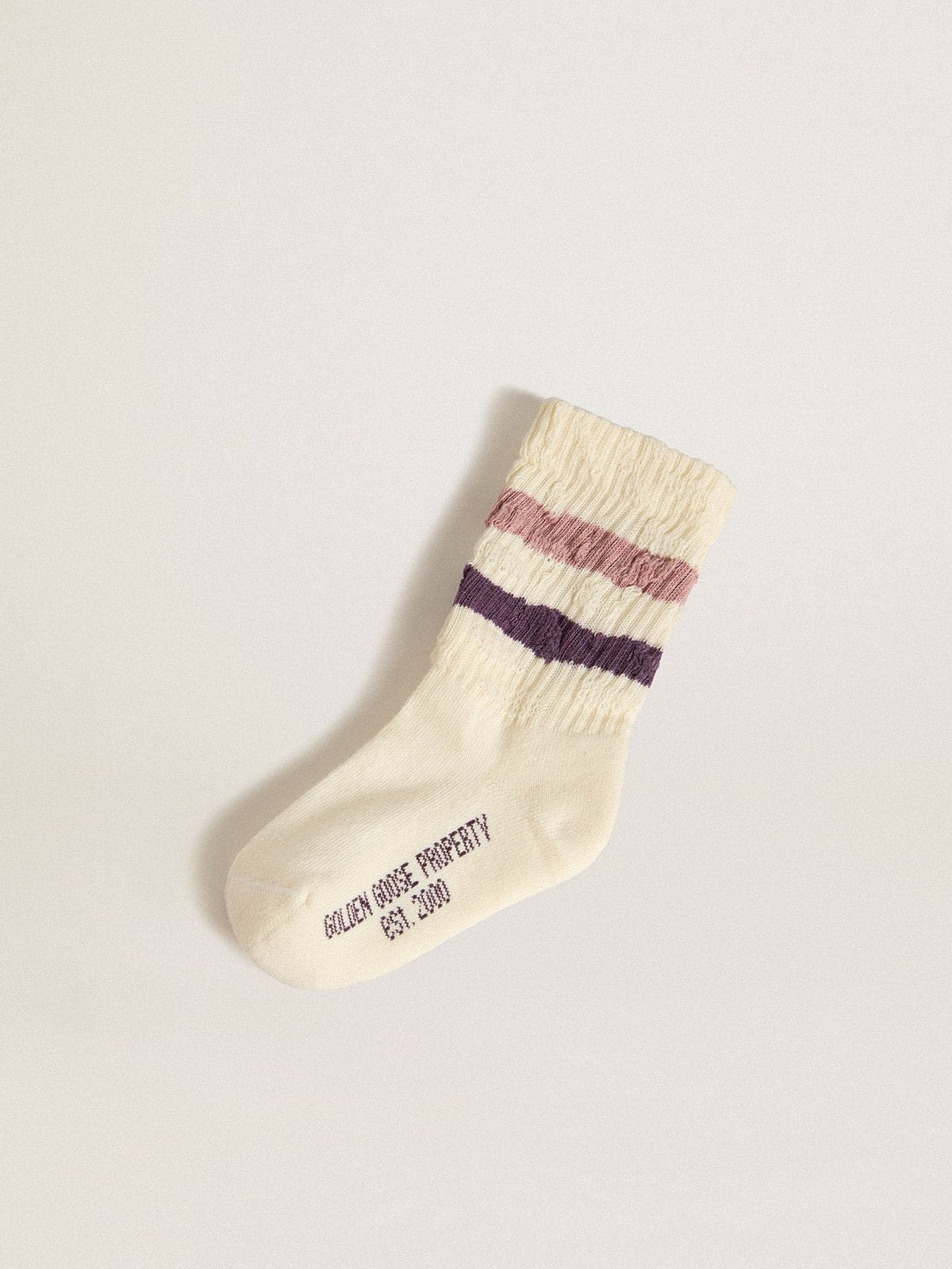 a9ad0ad56a4f1ff39334aa10a532f019559265487db1c2fdda6e6d67ee3802a8 Kids' white socks with pink and purple stripes - Image 1