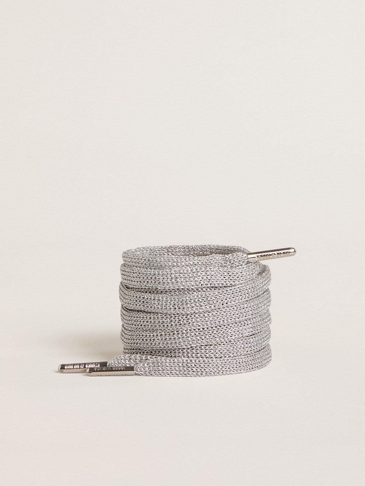 ac6e92bb6bf8d6ffe492b6c7d9a3969fde1385fbdfff1d5459f4c6f4ca95b6d4 Silver lurex laces - Image 1