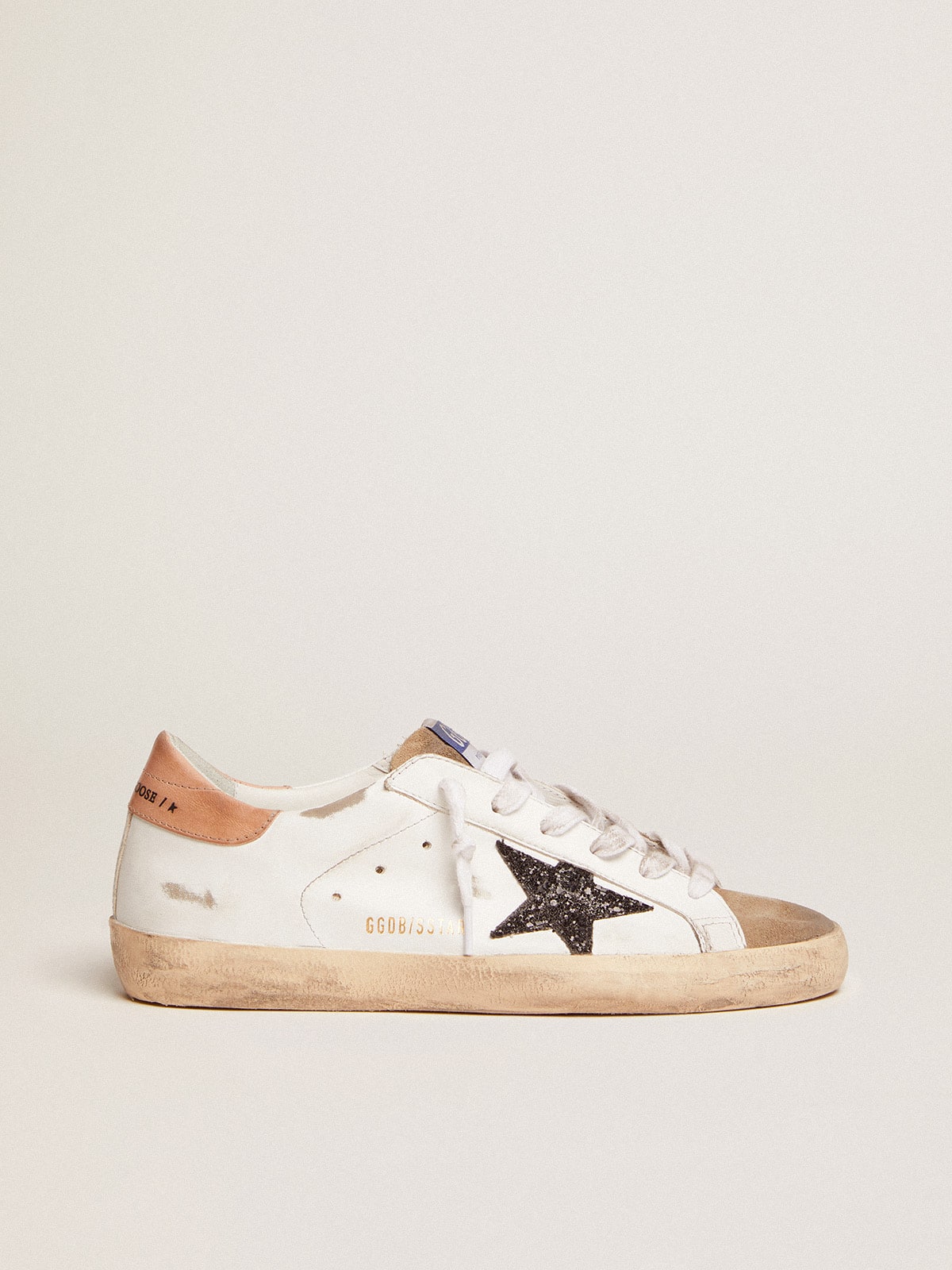 ad06231c229a99746275a3278f690d0d943df58e4ffebcf46ea2e6f3fbea510b Women's Super-Star with black glitter star and pink heel tab - Image 1