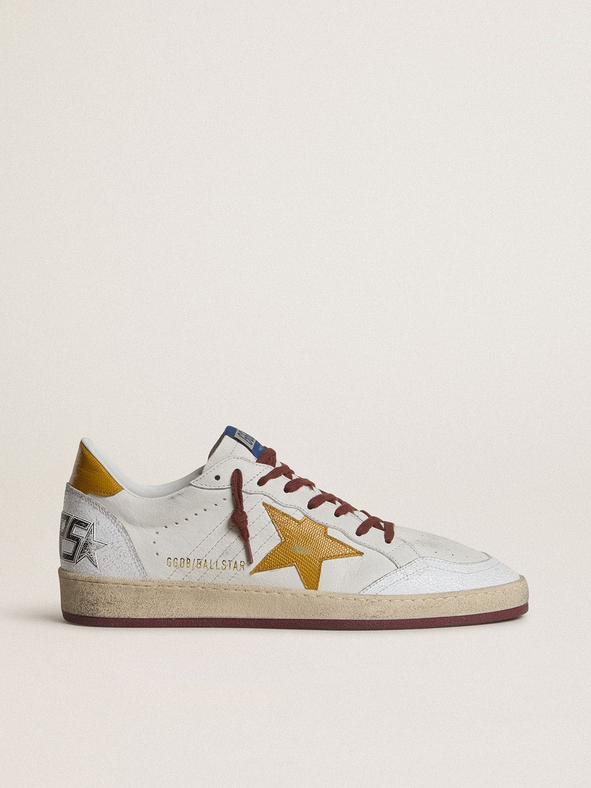 b2cd89279885f62a75d4e681931d7db8643df5265259a6f440fb6adca404bf0b Men's Ball Star in white nappa leather with yellow animal-print leather star and heel tab - Image 1