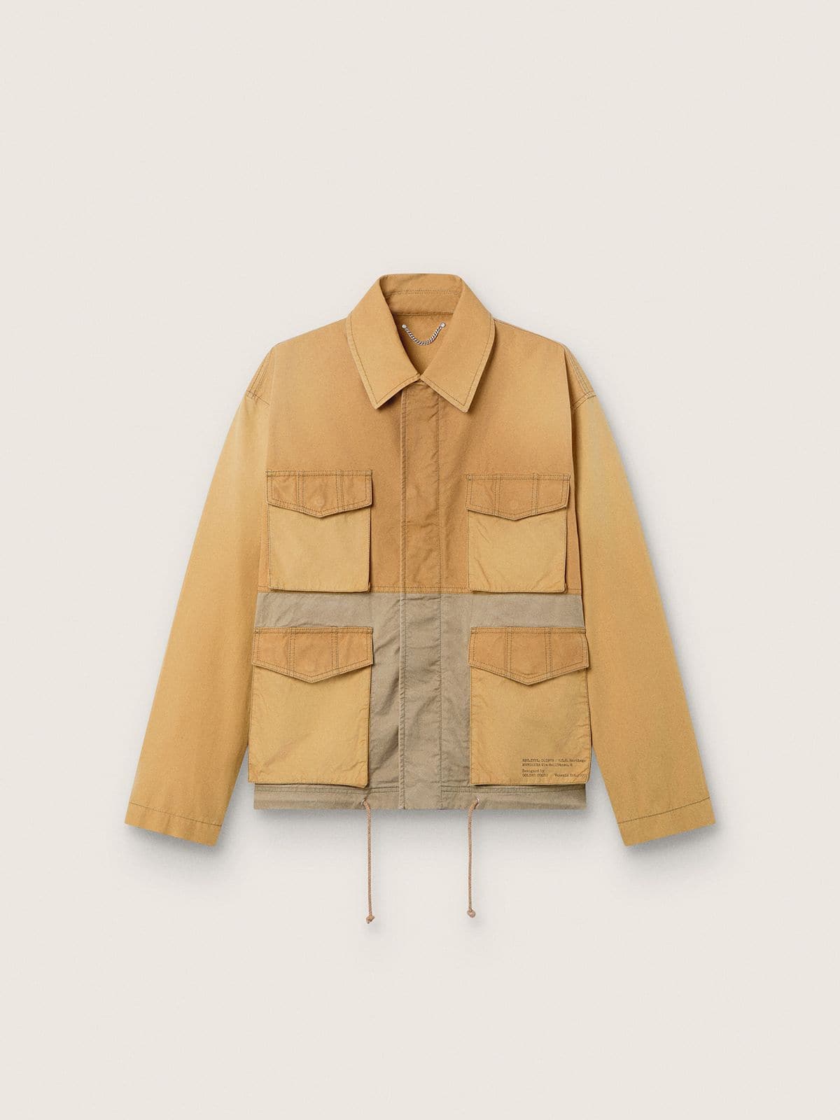 b5ab7b7de1ac174e2a815d9d14027eec5b81f77179875c331057ac5f55e1ec7f Unisex safari jacket in beige and military-green cotton with maxi pockets - Image 1