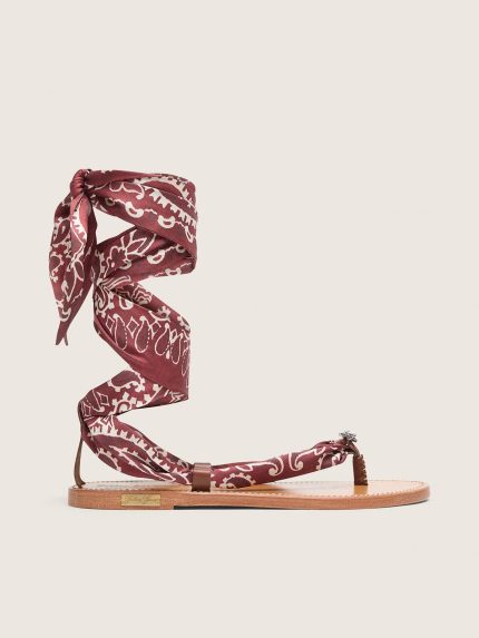 Women's flat sandals with burgundy paisley pattern and jewel detail