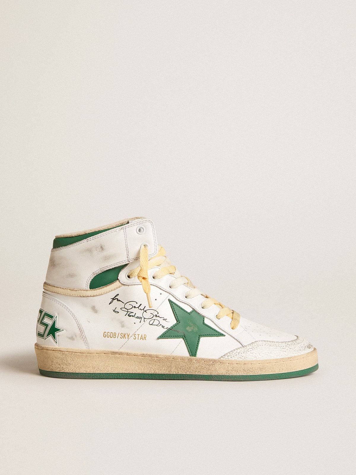 bb2cee3eddf14779e90b0a0f3c2cce3d25b894afe020258c09ad9a08b943f676 Sky-Star in white leather with green leather star - Image 1