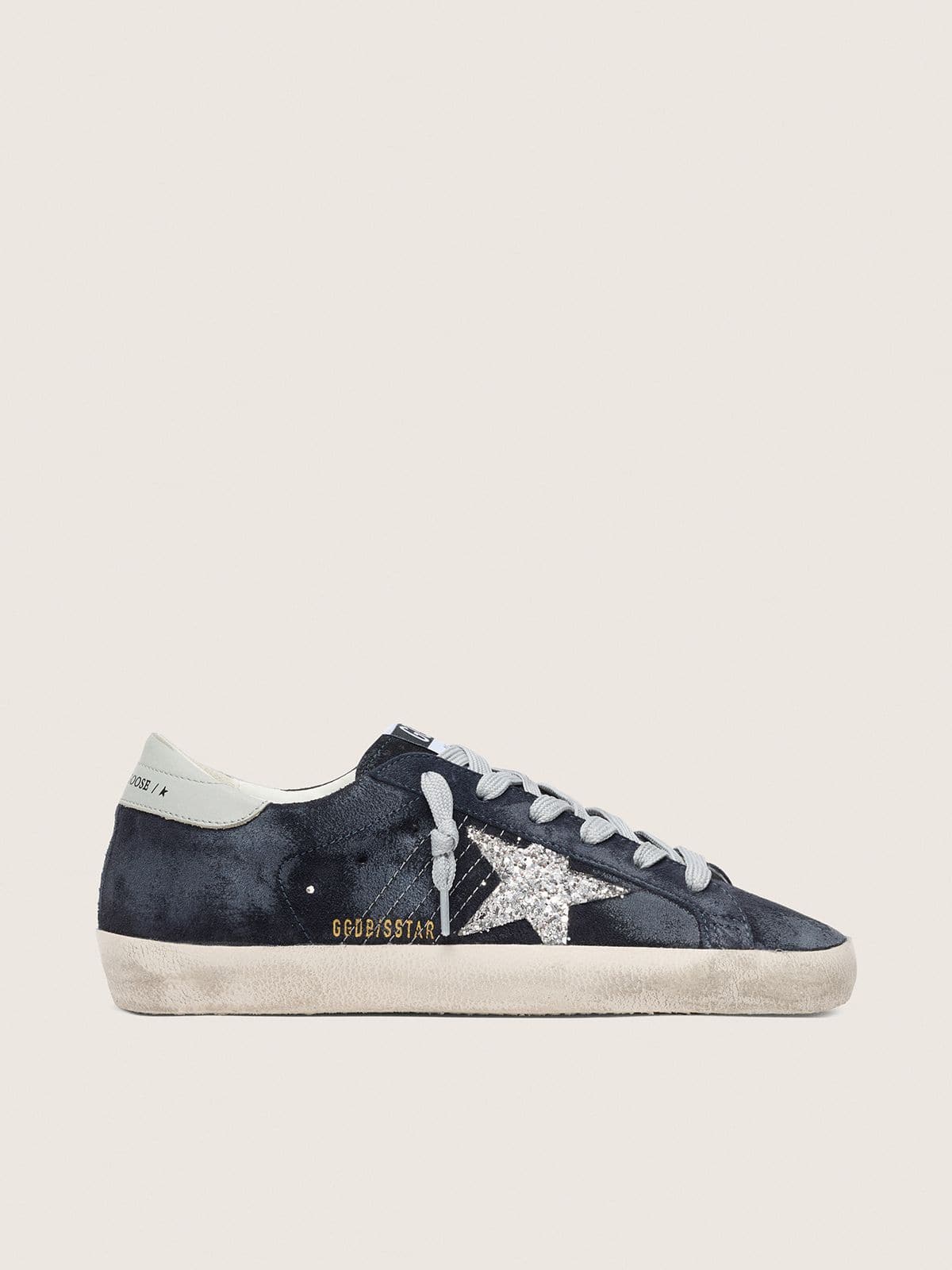 bbf48f8d14e3653cb29914956c0a5cde61db67b1235a9f96512e5cd8db6af6fa Women's Super-Star in blue suede with silver glitter star and leather heel tab - Image 1