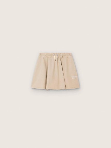 Journey girls' miniskirt in beige cotton gabardine with print