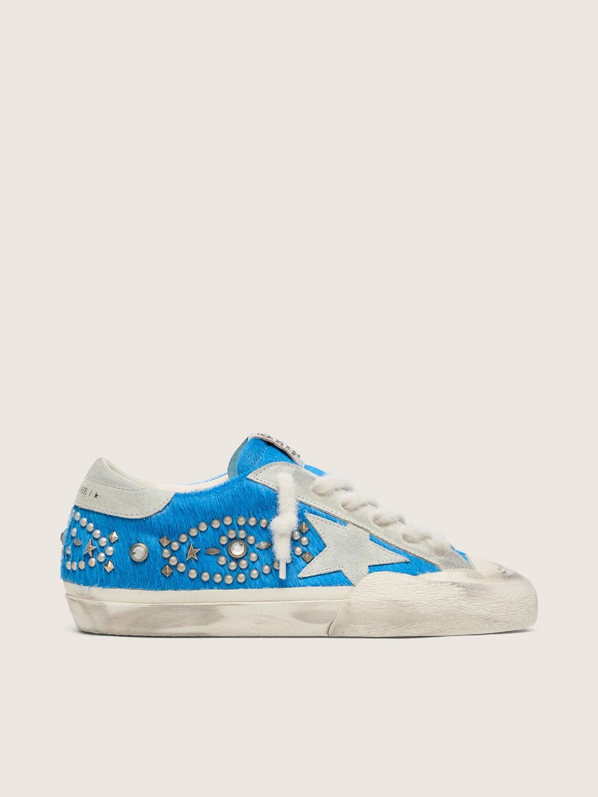 bcb726a2f4979fe35f534861a95b2a087c937ffa2b2c26c8532eaad644f61ad7 Women's Super-Star LAB in bright blue pony skin with suede star and studs - Image 1
