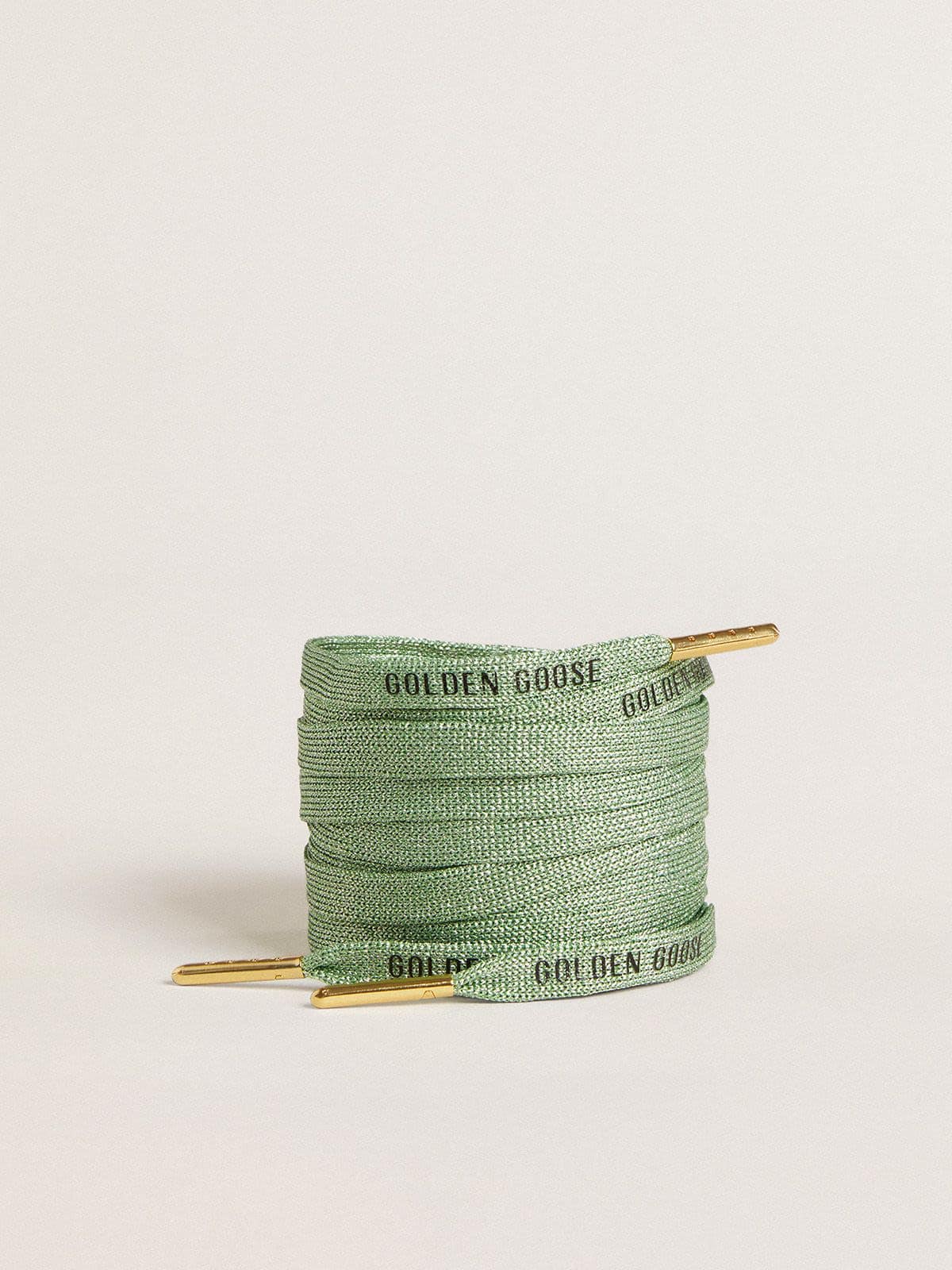 bdaa3436c96c7a27425fb15d8d7c1976a5a776142e52884f51b9da4b6a49108c Aqua-green Lurex laces with contrasting black logo - Image 1