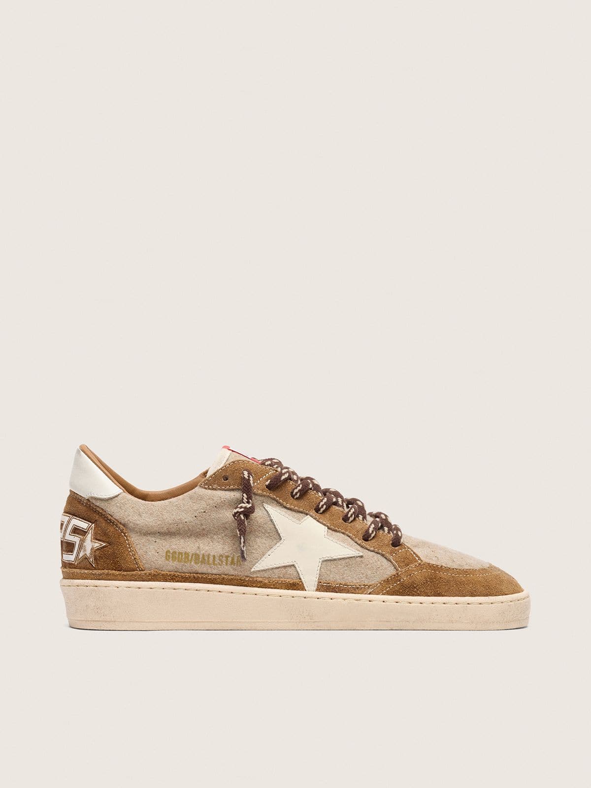 c297c07c474dc31d53688a3ba208271c1b3946b8ea3fe2d624de6fa56d70ed88 Men's Ball Star in wool with cream leather star and brown waxed leather inserts - Image 1