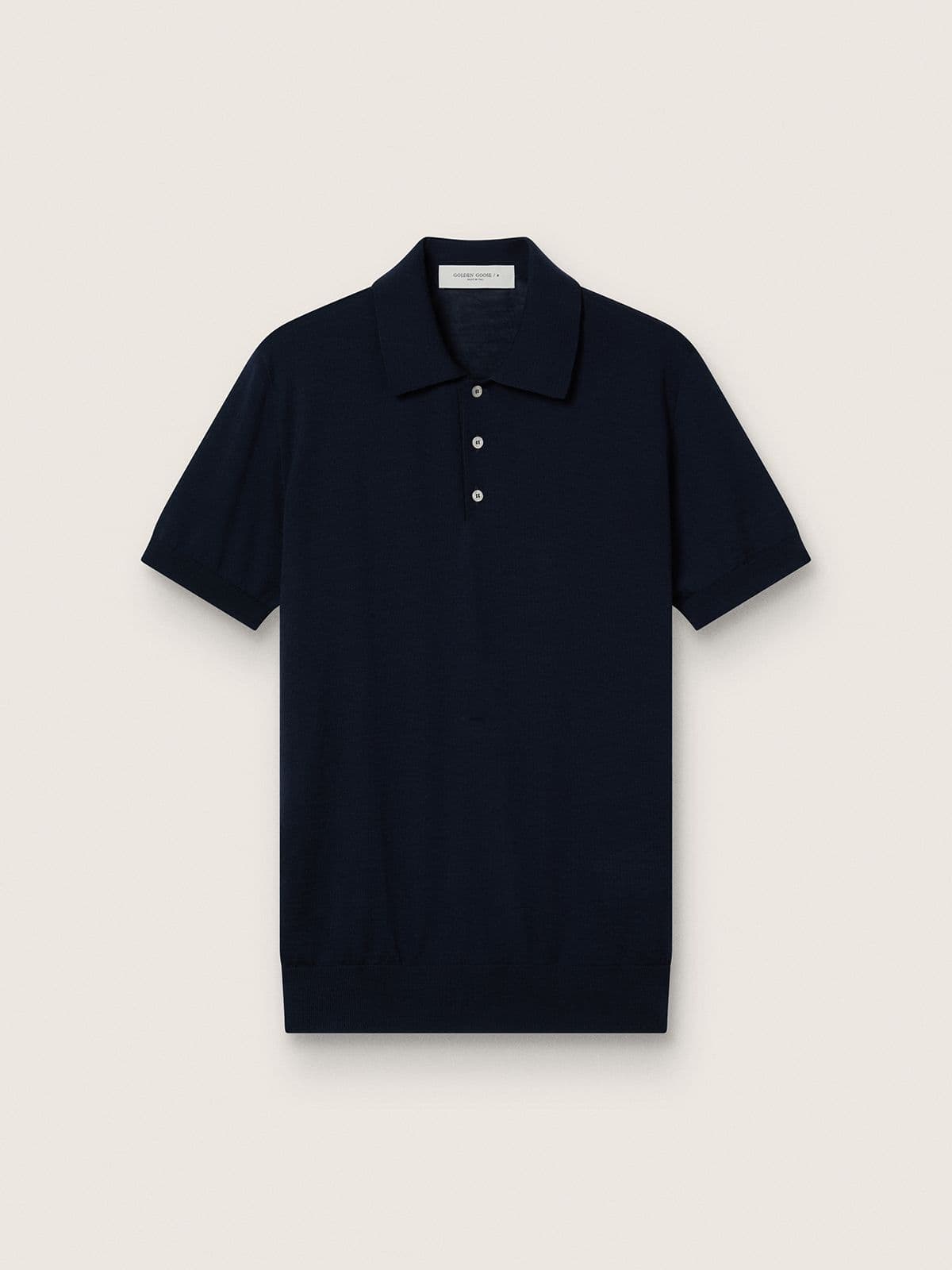 c360c661f72f918b688a7dc78ec1d27081b00ddd7a5f8d9b075acbb3bda52bd1 Men's short-sleeved polo shirt in navy-blue merino wool - Image 1