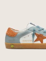 Young Super-Star in white and ice-blue leather with orange suede star - Image 4