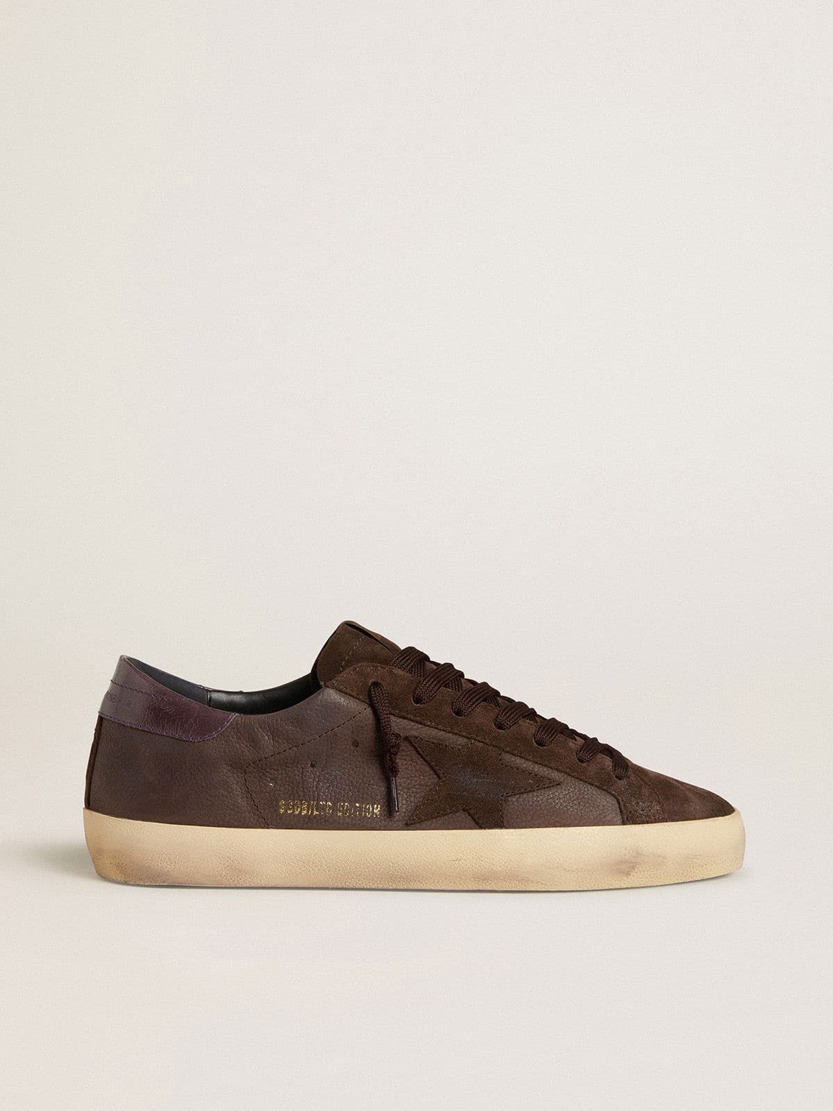 c9ad608c10fc19242d494f43ed43639b1b3f7eb0947105f76da5546228c39629 Men's Super-Star LTD in brown nubuck with suede star and purple leather heel tab - Image 1
