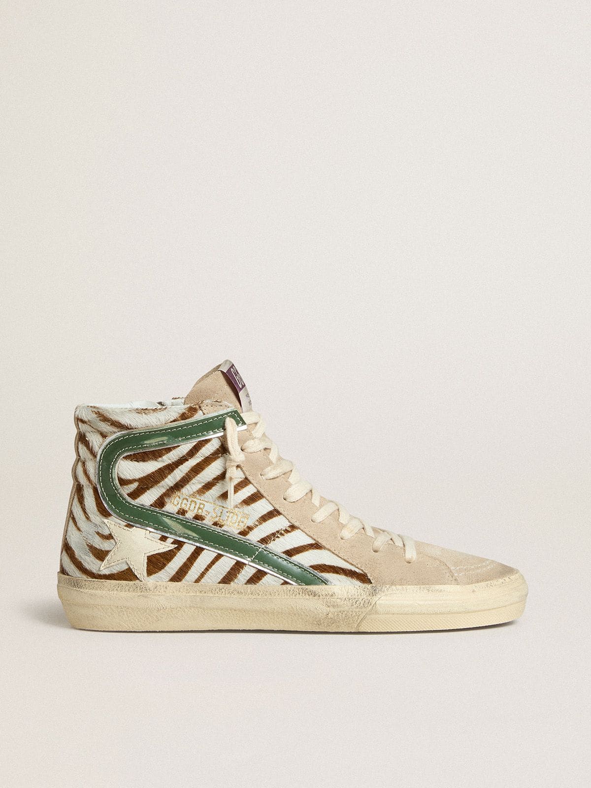 cbca116229ae56817683f8eda1fe6730218e47827993ecfaadbee99a394716ce Women's Slide in zebra-print pony skin with green laminated leather flash - Image 1