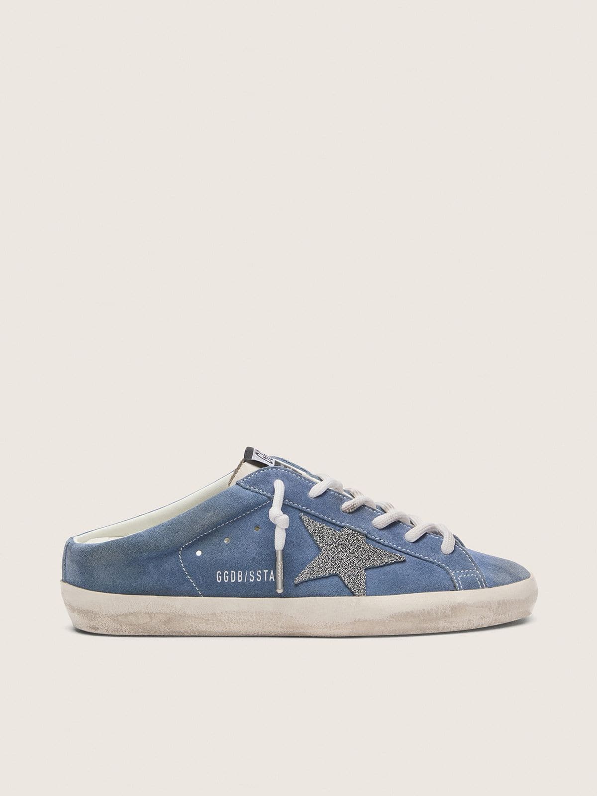 cedbc0bbbffe068592a13c6a2f54b36be3240fe400fa13d2e7799b44d4e5d17b Women's Super-Star Sabots in denim-blue suede with silver glitter star - Image 1