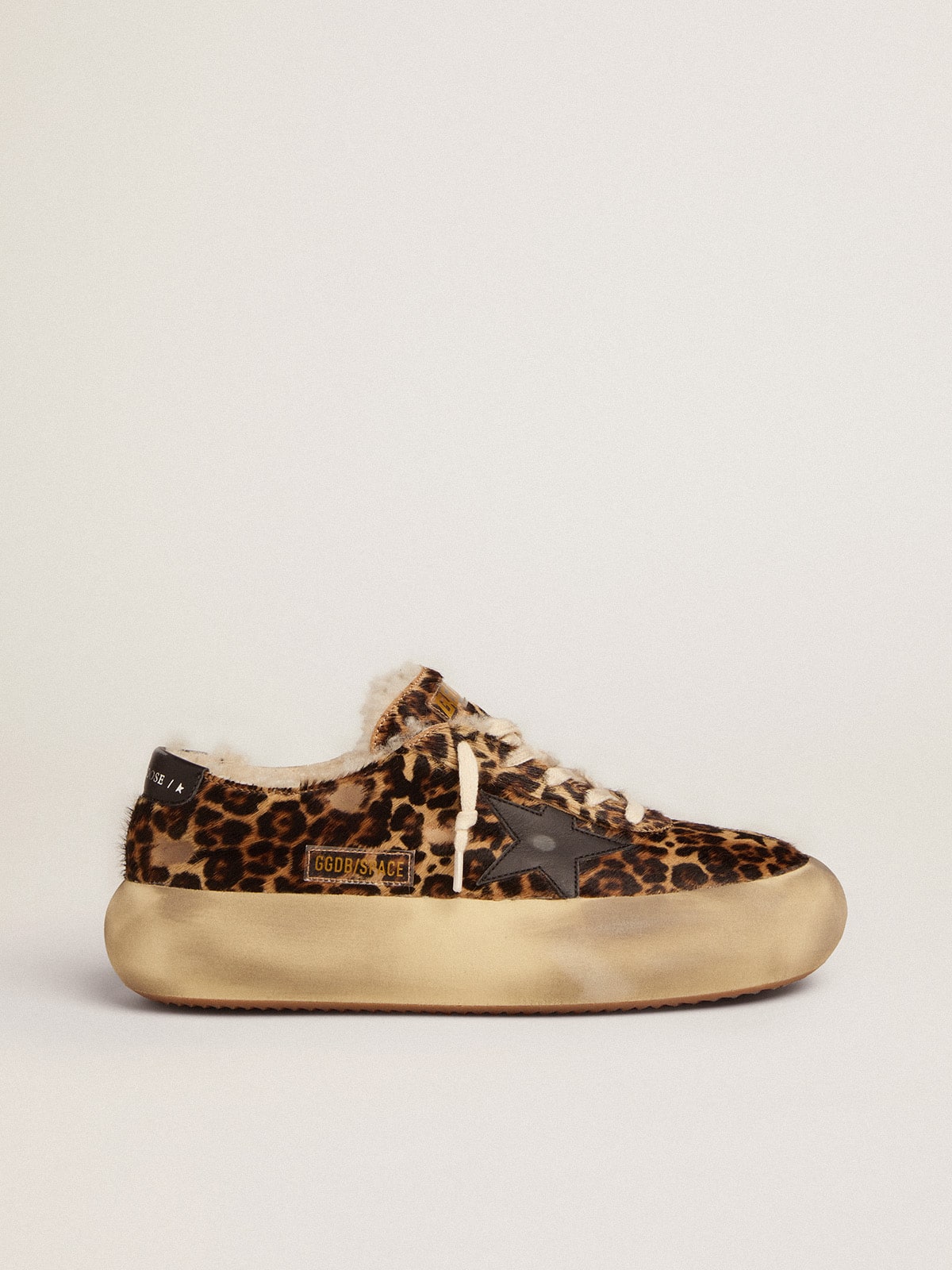 d06d02d38fca3193cb0c51a604a55dd40acdb27aca39ea23aa77a58444fcc03b Men's Space-Star in animal print pony skin and shearling lining - Image 1