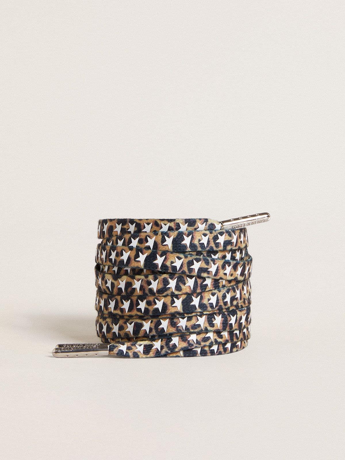 d0eb3a69c9b56dc783dbafa0b5e2909706a666a0d3a8424d80305100b3288ba8 Brown leopard-print laces with contrasting white stars - Image 1