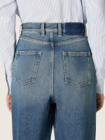 Golden women's boyfriend jeans in stone-washed light blue denim - Image 4