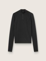 Women's black long-sleeve sports top with zip