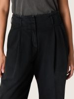 Women's pants in black cotton denim with a lived-in treatment - Image 4